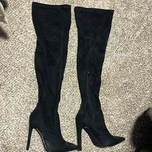 Channel your Ariana Grande. Black knee-high stiletto boots! NEVER WORN